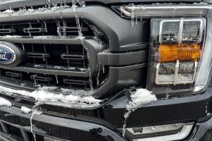 Snow and ice on a Ford F-150 truck at Brighton Ford, Michigan